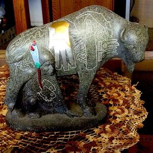 American Bison / Buffalo with Native American Sitting Underneath.